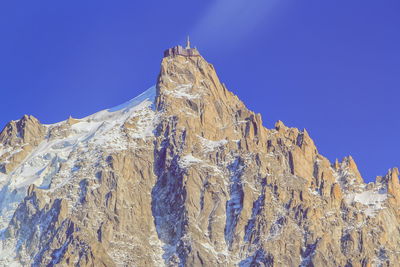 Aiguille du midi at chamonix by beautiful day, mont blanc massif, alps, france