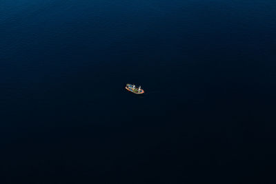 High angle view of boat floating on sea