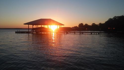 Scenic view of sea at sunset