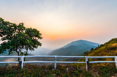 Scenic view of mountains against sky during sunset