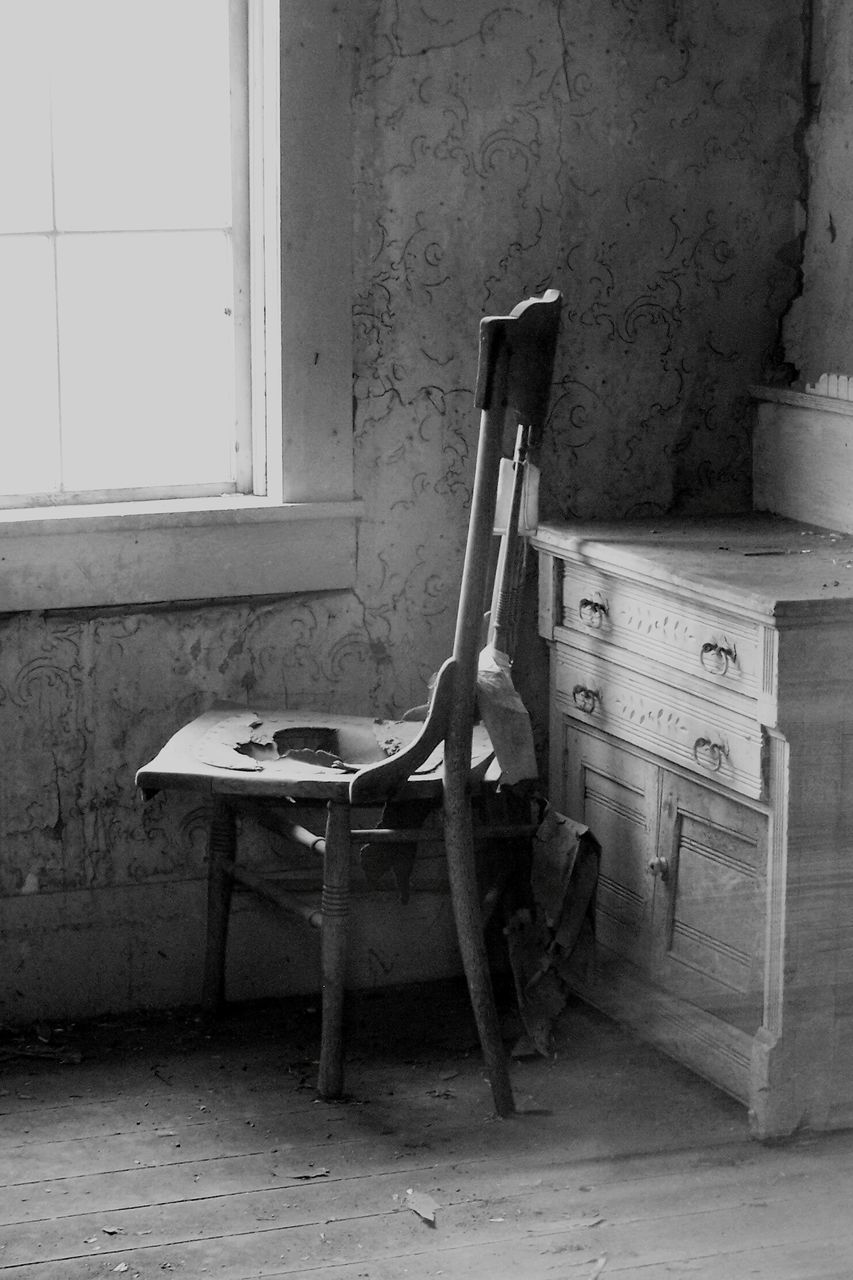 architecture, built structure, wall - building feature, old, absence, wall, abandoned, indoors, building exterior, chair, transportation, empty, obsolete, damaged, stationary, no people, day, house, building, bicycle