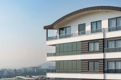 Detail of the exterior of a modern residential apartment building. 