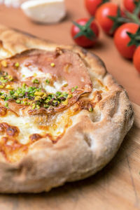 Close-up of pizza on cutting board