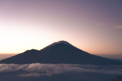 Scenic view of mountains against sky during sunset