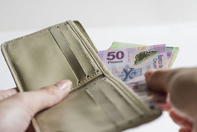 Close-up of hand holding text