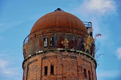 Low angle view of old building against sky