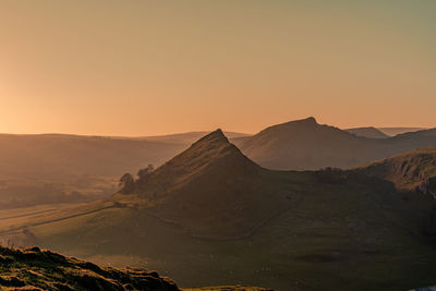 Scenic view of mountain against sky during sunset