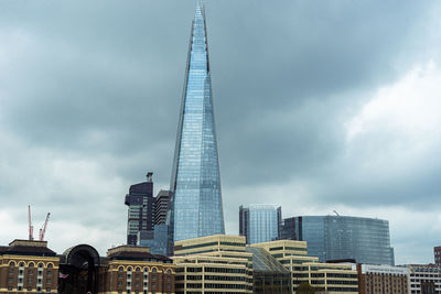 Low angle view of skyscrapers against sky