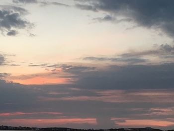 Low angle view of dramatic sky during sunset