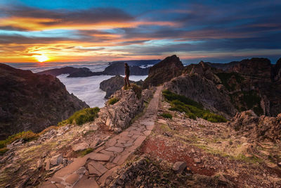 Scenic view of dramatic landscape during sunset