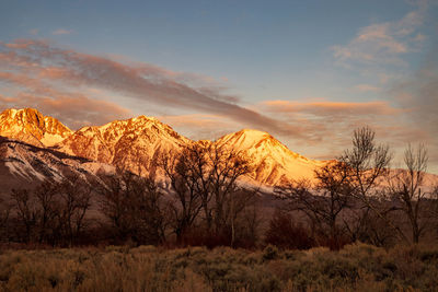 Scenic view of mountains against sky during sunset