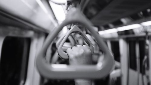 Close-up of hand in the subway