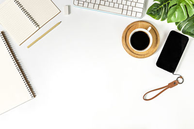 High angle view of coffee cup on table