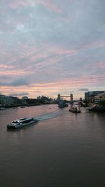 Scenic view of river against sky during sunset