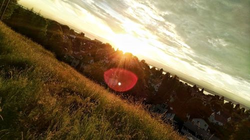 Scenic view of landscape against sky during sunset