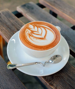 Close-up of cappuccino on table