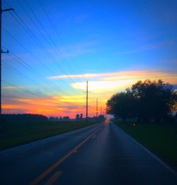 Empty road at sunset