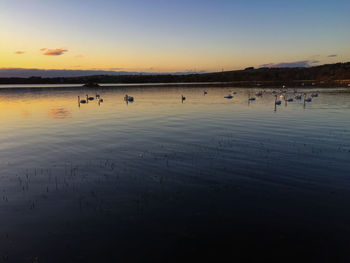 Scenic view of sea at sunset