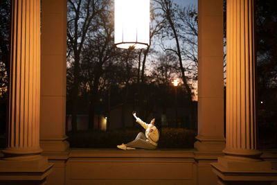 Low angle view of statue against building