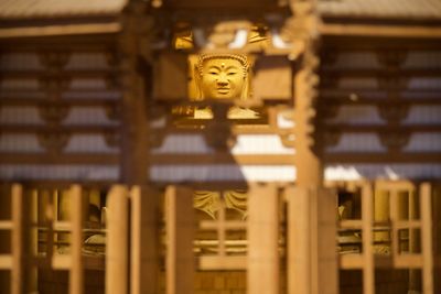 Statue of buddha outside building