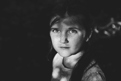 Close-up portrait of serious young woman