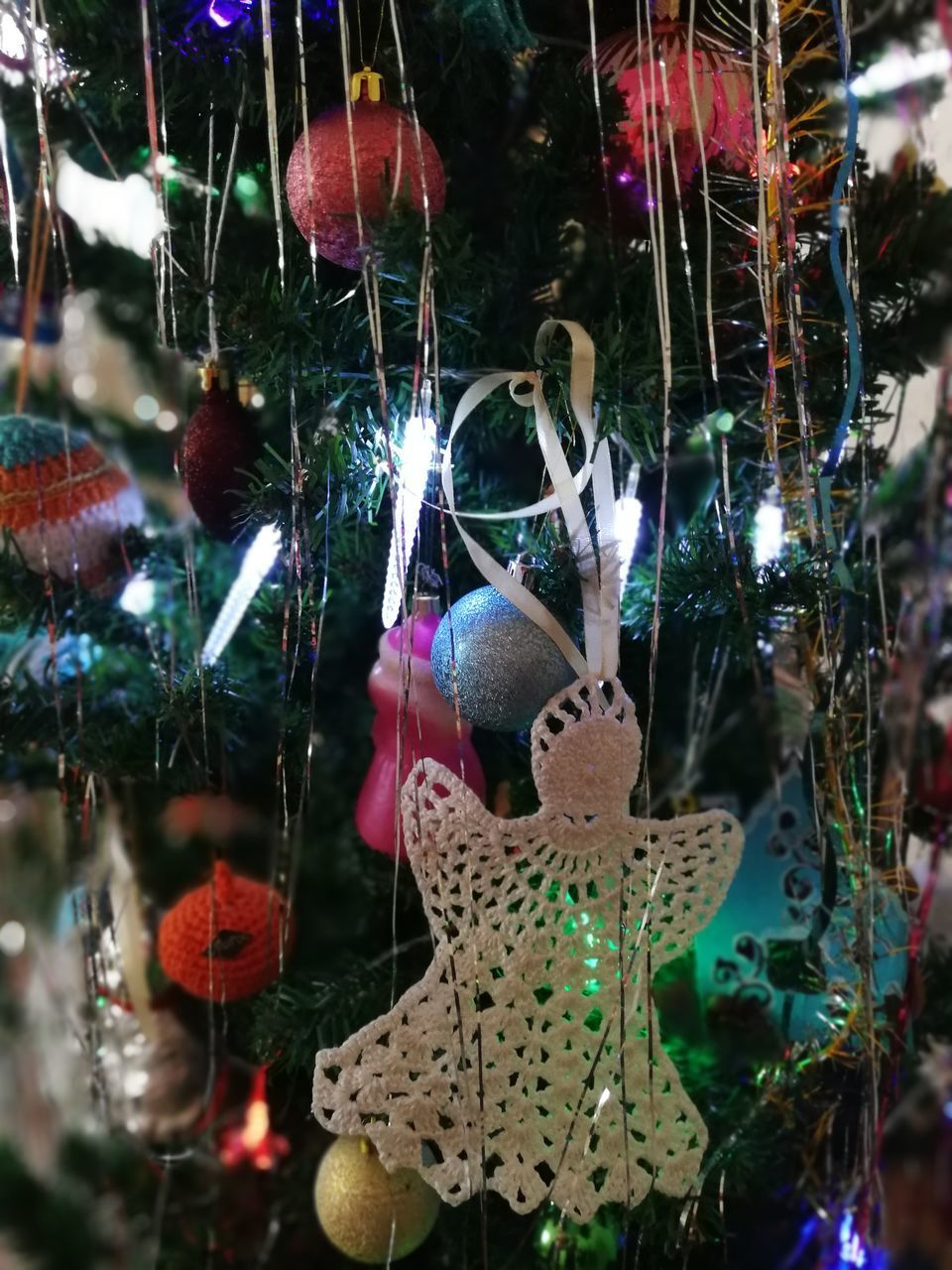 CLOSE-UP OF ILLUMINATED CHRISTMAS TREE