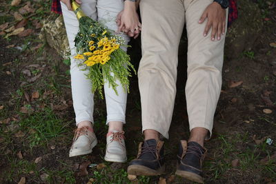 Couple lying on the garden