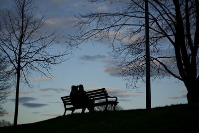 Silhouette bench in park