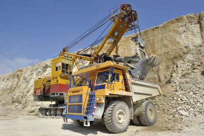 Earth mover working at quarry