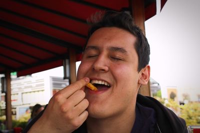 Close-up of man eating