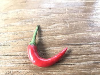 High angle view of red chili peppers on table