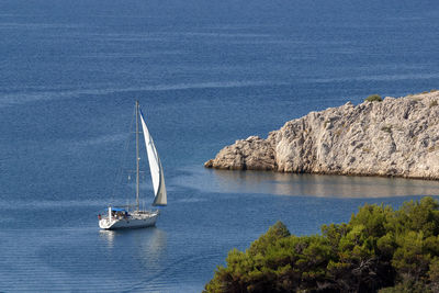 Sailboat sailing in sea