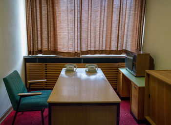 Rotary phones on desk in office