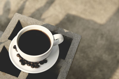 High angle view of coffee cup on table