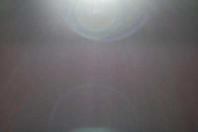 Low angle view of bubbles against sky