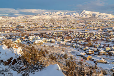 High angle view of snow covered landscape against sky