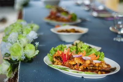 Close-up of serving food in plate