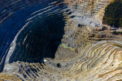 Aerial drone view of rosia poieni open pit copper mine, romania