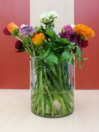 Close-up of flowers in vase on table