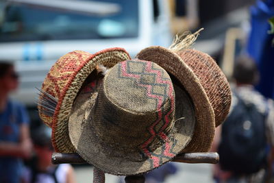 Close-up of hat hanging at market stall
