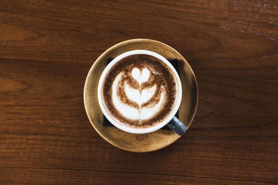 Directly above shot of cappuccino on table