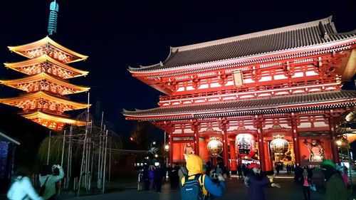 Tourists at night