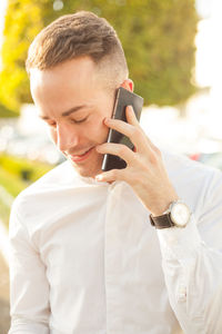 Young man using mobile phone
