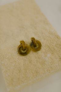 High angle view of wedding rings on table