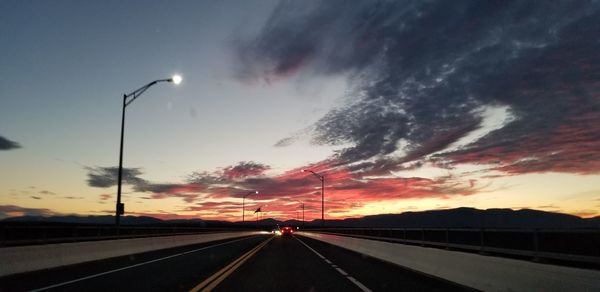 Road against sky during sunset