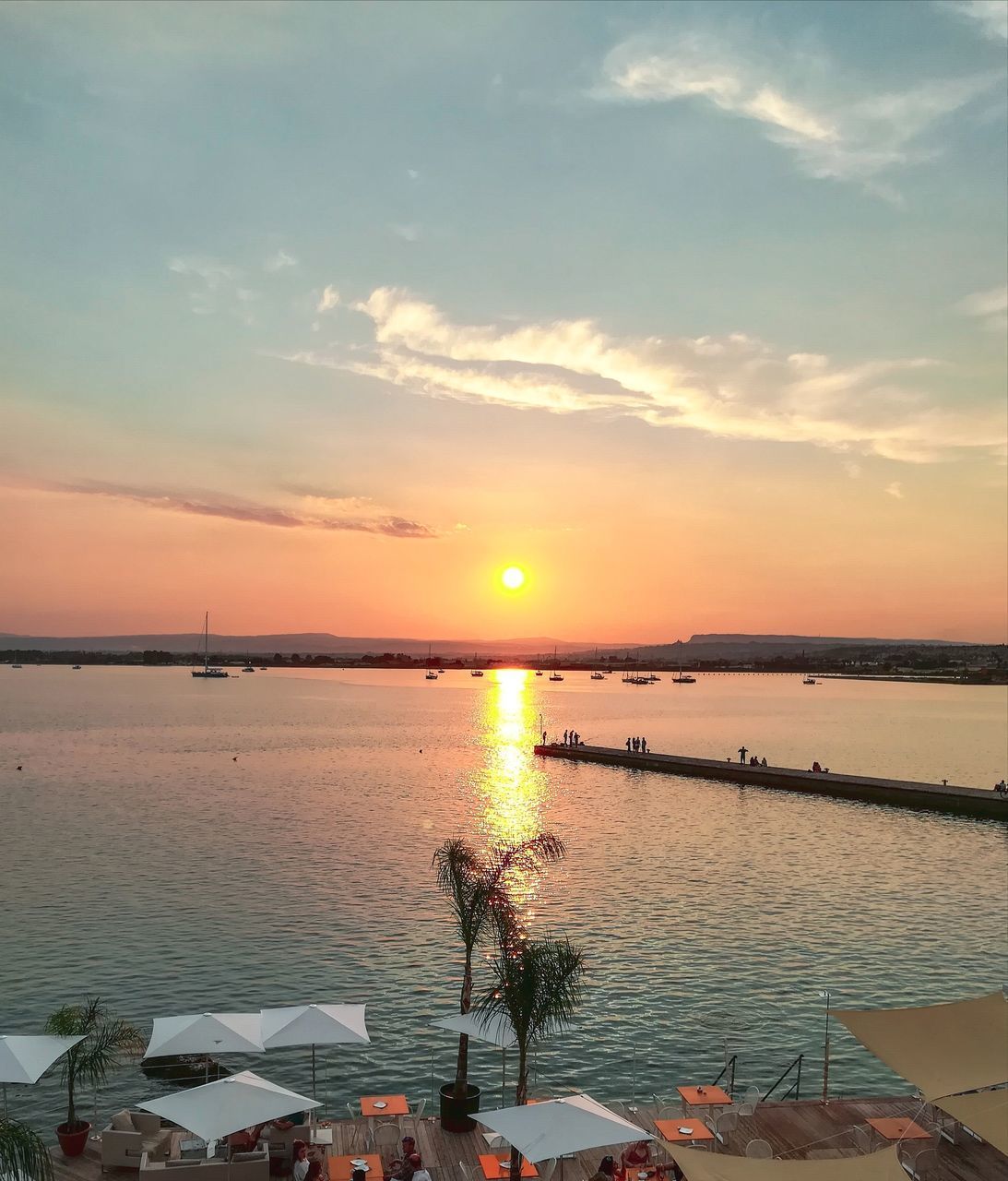 SCENIC VIEW OF SEA DURING SUNSET