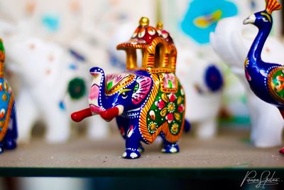 Close-up of figurine on table