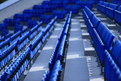 Empty blue seats at auditorium