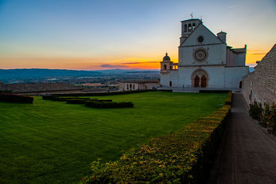 View of historic building against sky during sunset