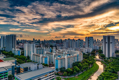 High angle view of buildings against sky during sunset